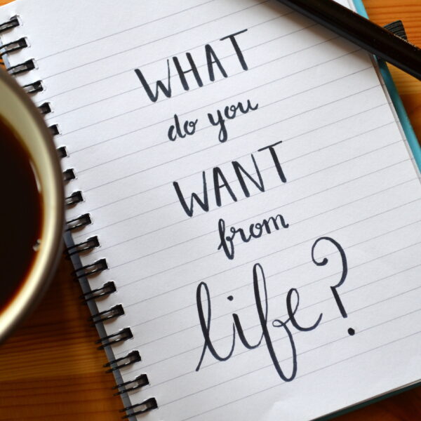 Quote on notepaper “WHAT DO YOU WANT FROM LIFE?”